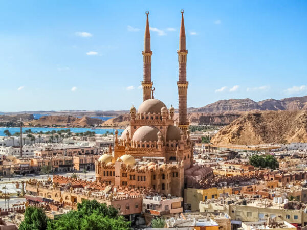 Top view of the Old Market and Al Sahaba Mosque in Sharm El Sheikh, Egypt. Aerial panorama of an Egyptian resort town with the Red Sea on the horizon